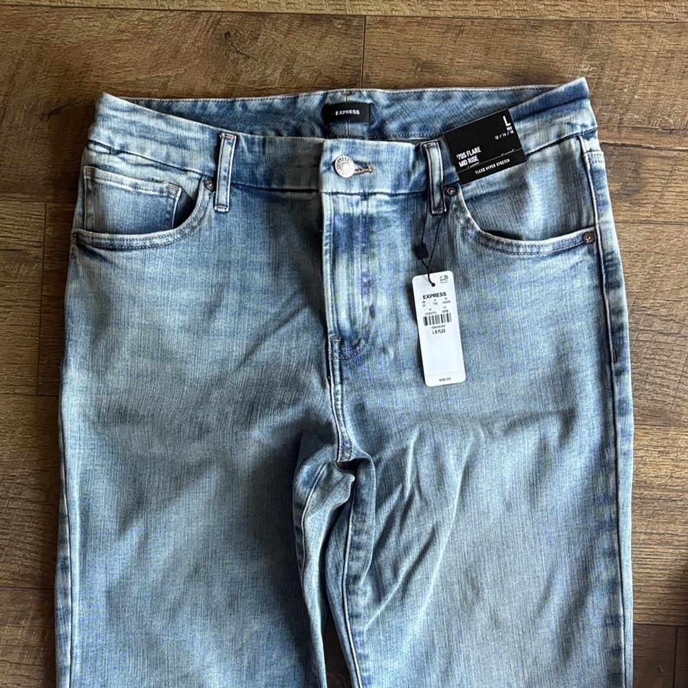 Express women flare leg, light blue jean NWT size L